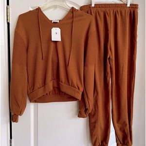 NWT Mustard colored lightweight sweat suit.